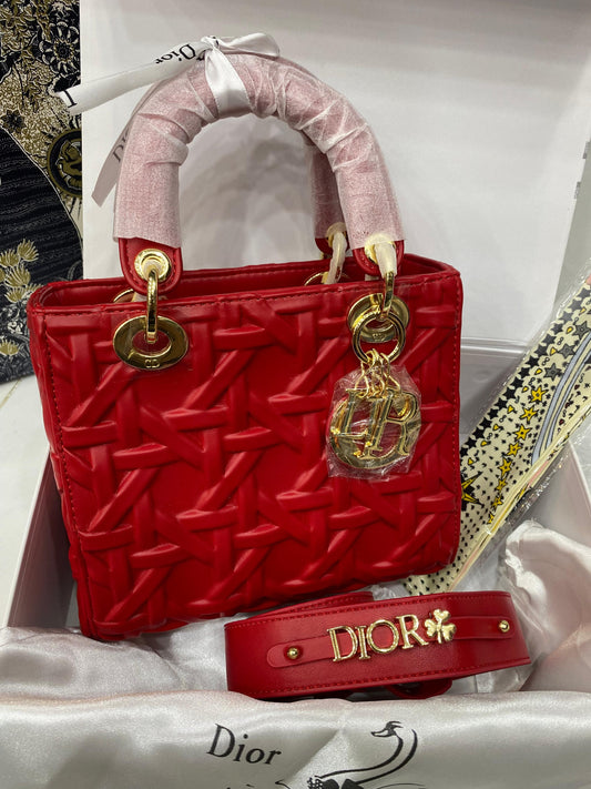 Medium Lady Christian Dior Bag in black Cannage lambskin.