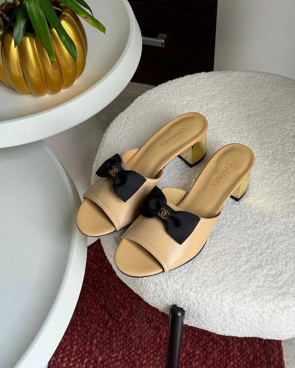 C-h-a-n-e-l bow heel