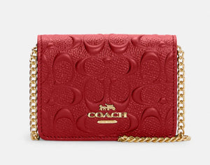 Fioure Signature Leather Mini Crossbody on Chain — Gold Logo Plaque & Zip Closure