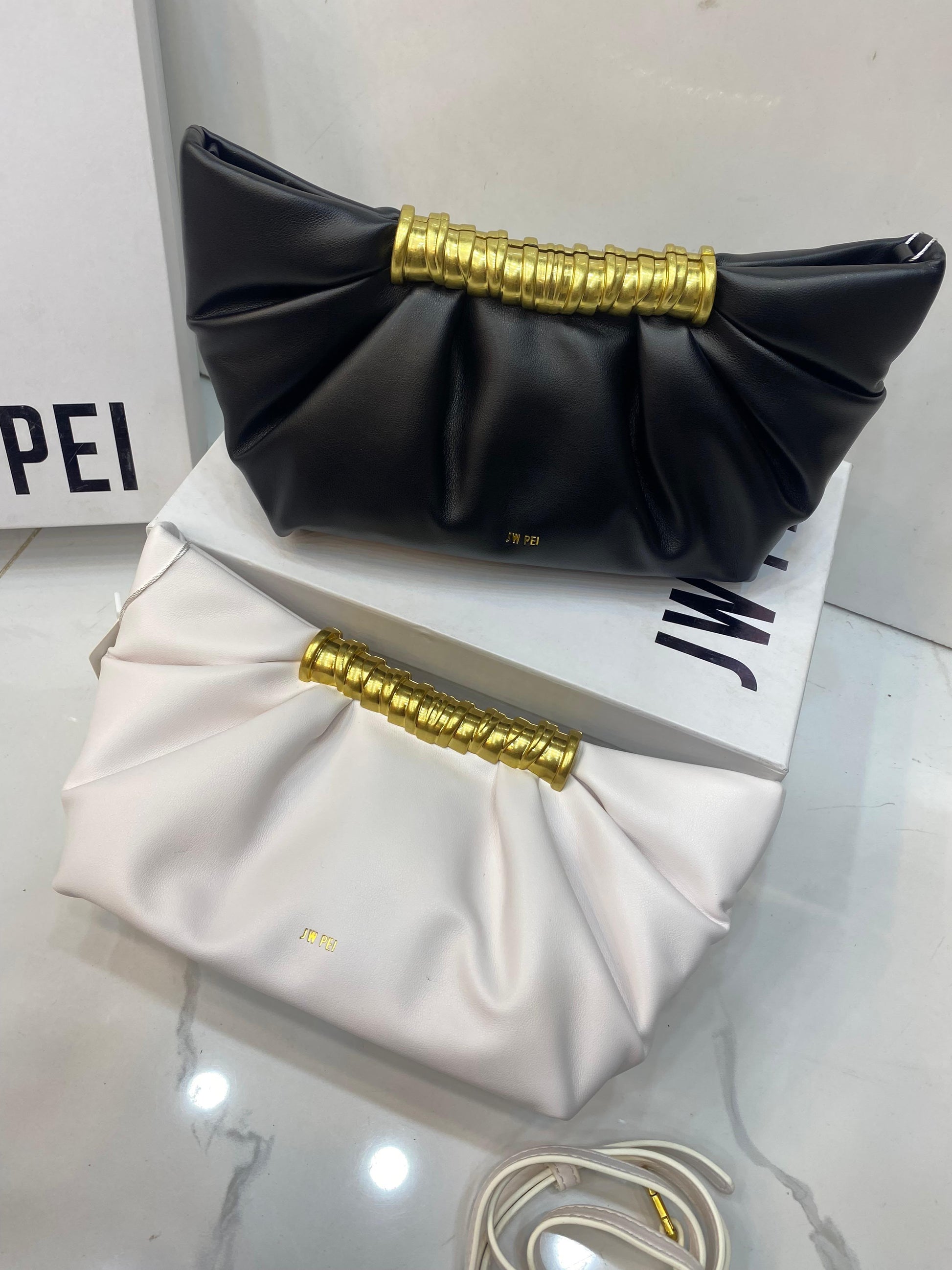 Fioure Leia Ruched Clutch — black and white with branded box