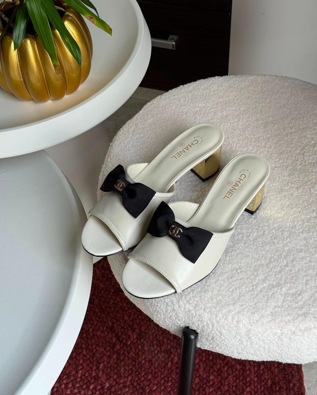 C-h-a-n-e-l bow heel