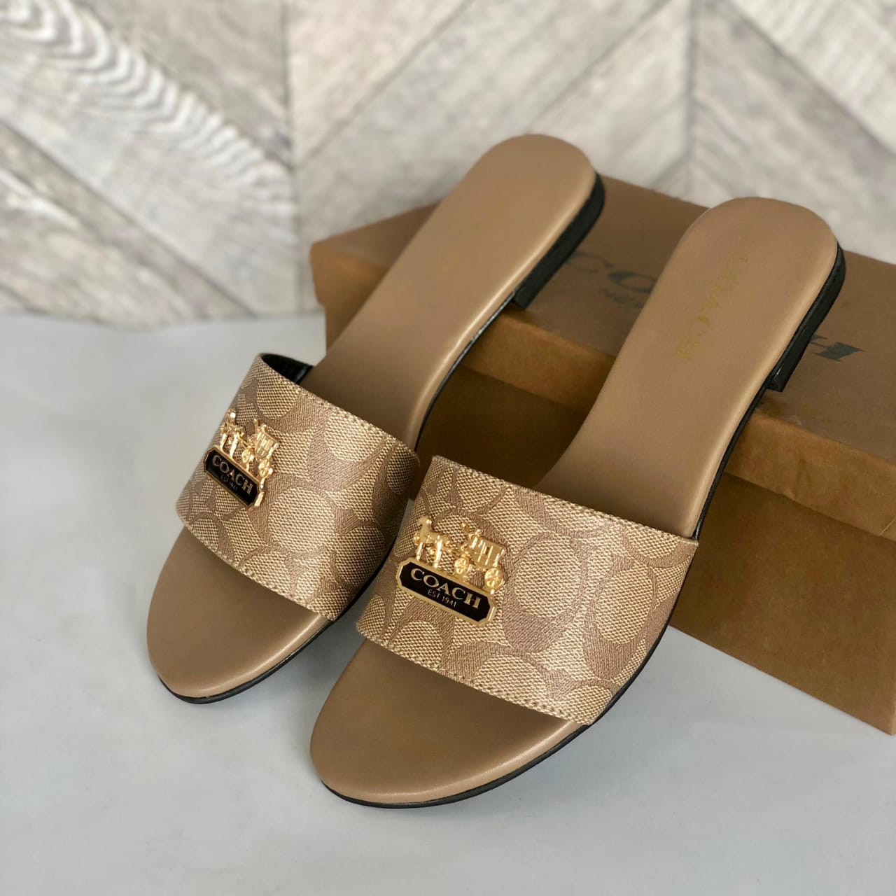 C-o-a-c-h slipper
