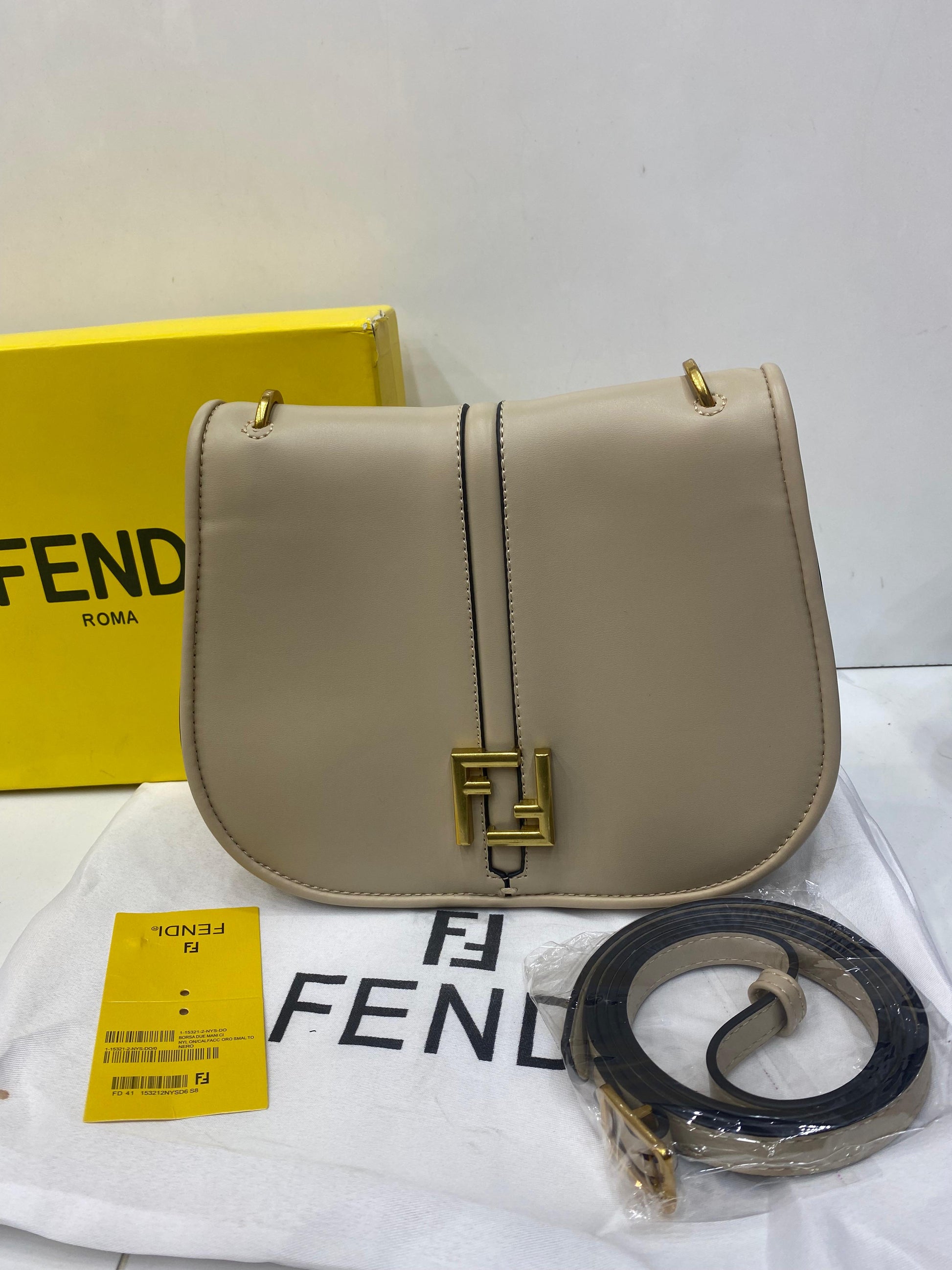 FENDI -medium C’mon leather cross body bag ( with Box )