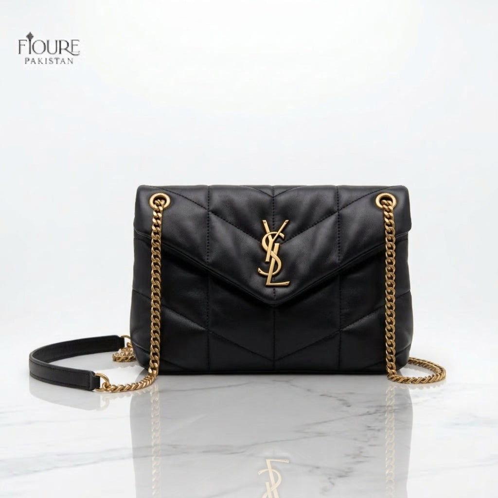Black quilted puffer chain bag with gold hardware