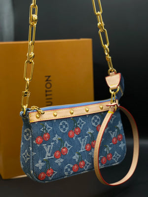 Fioure x Pochette Accessoires — Monogram Canvas in Smalt Blue