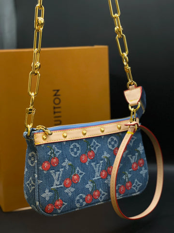 Fioure x Pochette Accessoires — Monogram Canvas in Smalt Blue