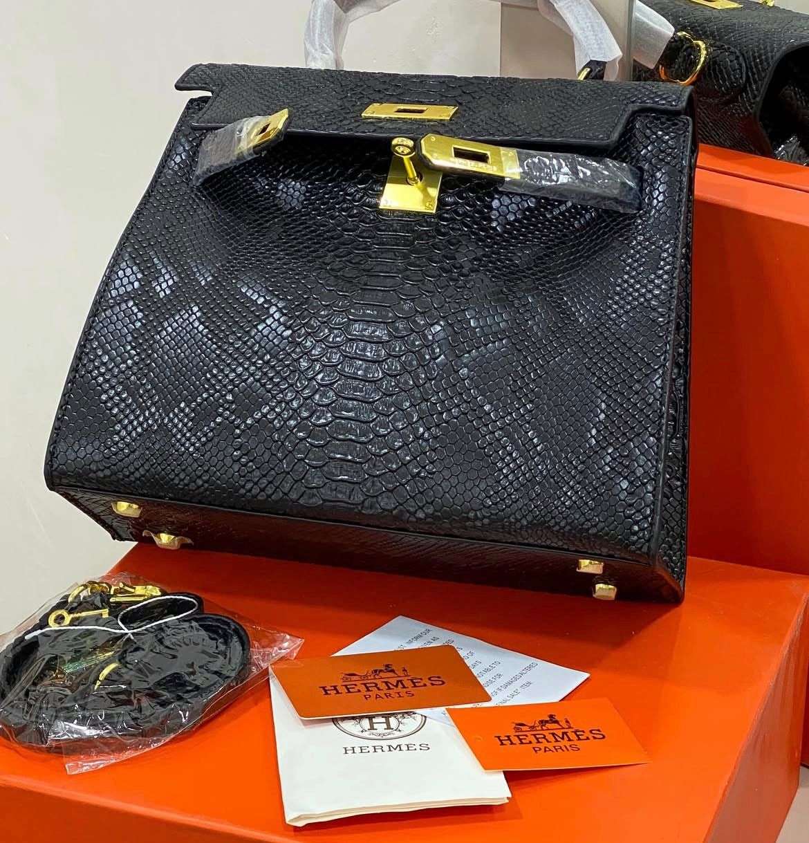 HERMÈS Kelly 28cm Crocodile with Palladium Hardware