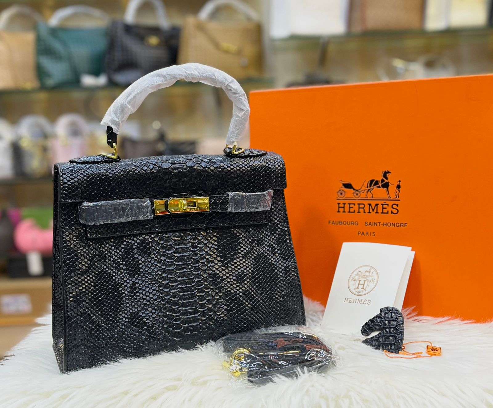 HERMÈS Kelly 28cm Crocodile with Palladium Hardware