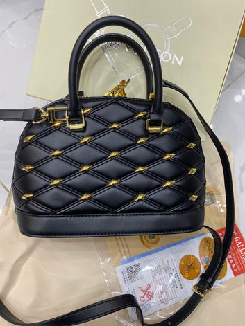 LOUIS VUITTON Alma Studs Tote Bag