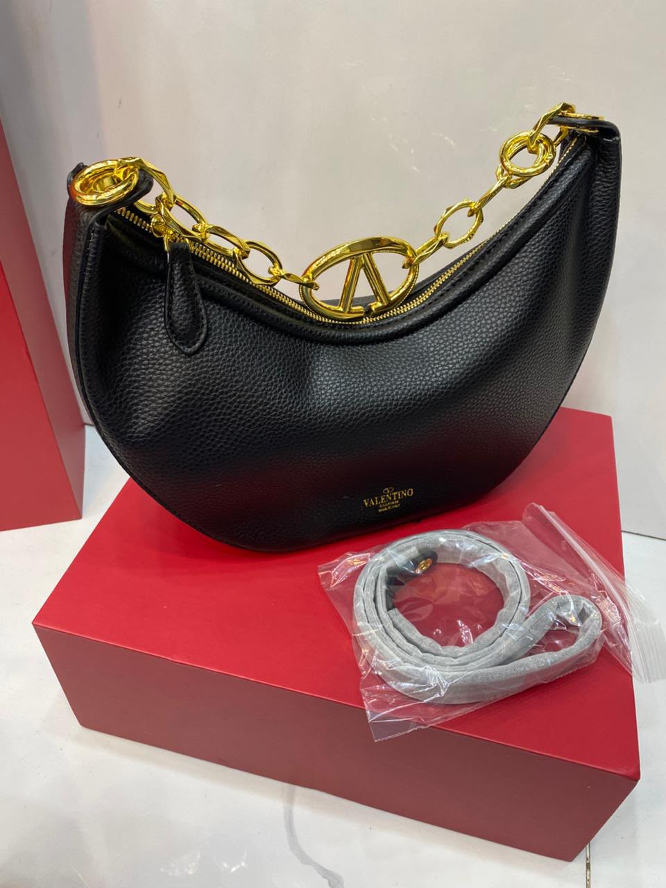 VLTN Vlogo Moon Medium Hobo Bag - Brown studio shot