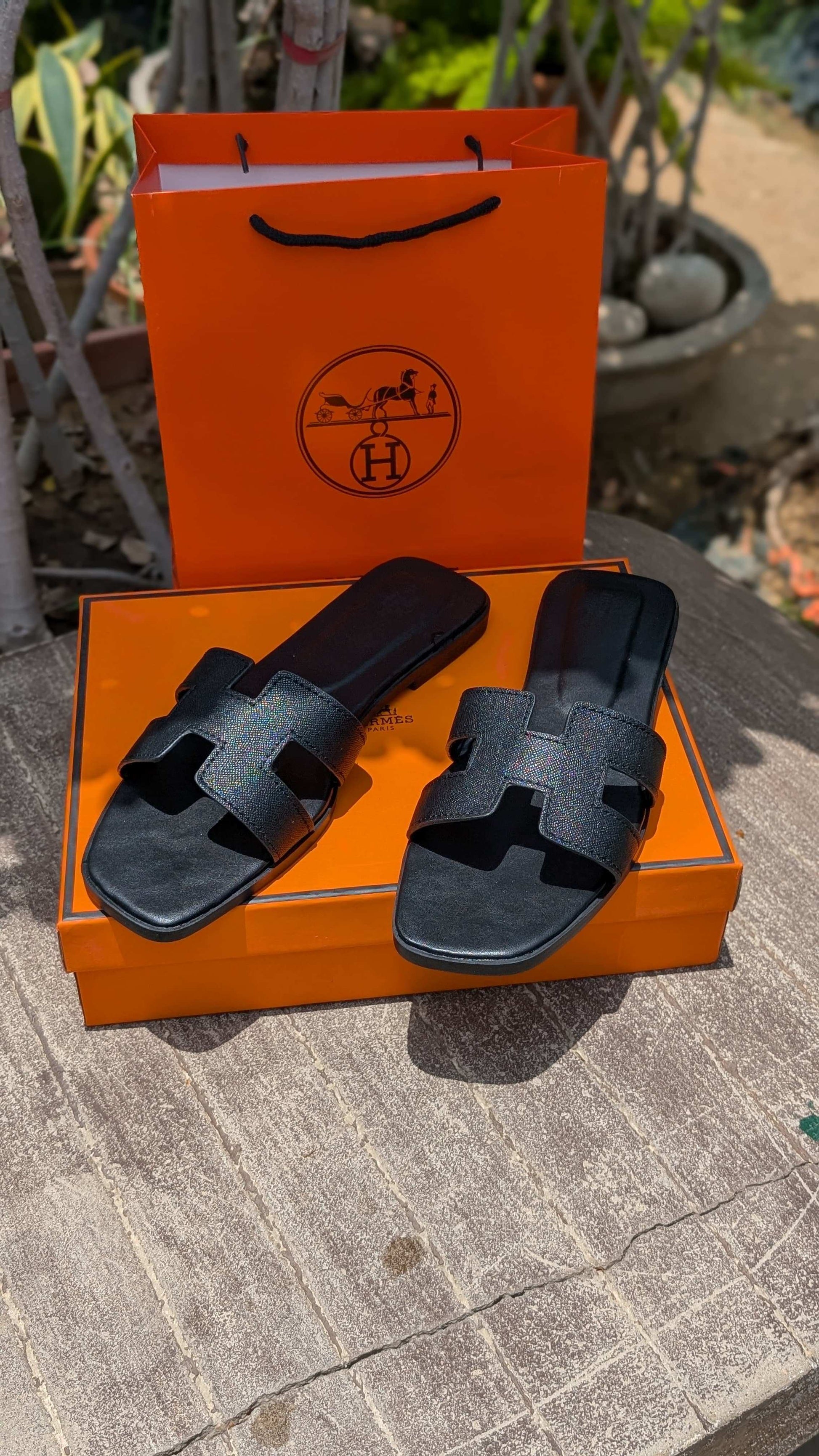 Imported Herme's-slippers*