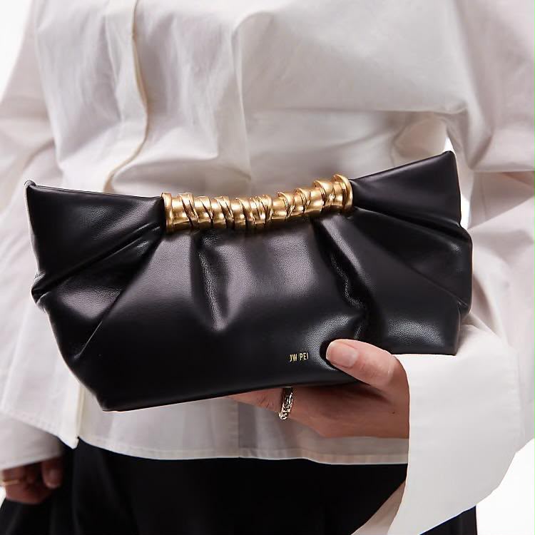 Fioure Leia Ruched Clutch — black close-up with gold coil handle