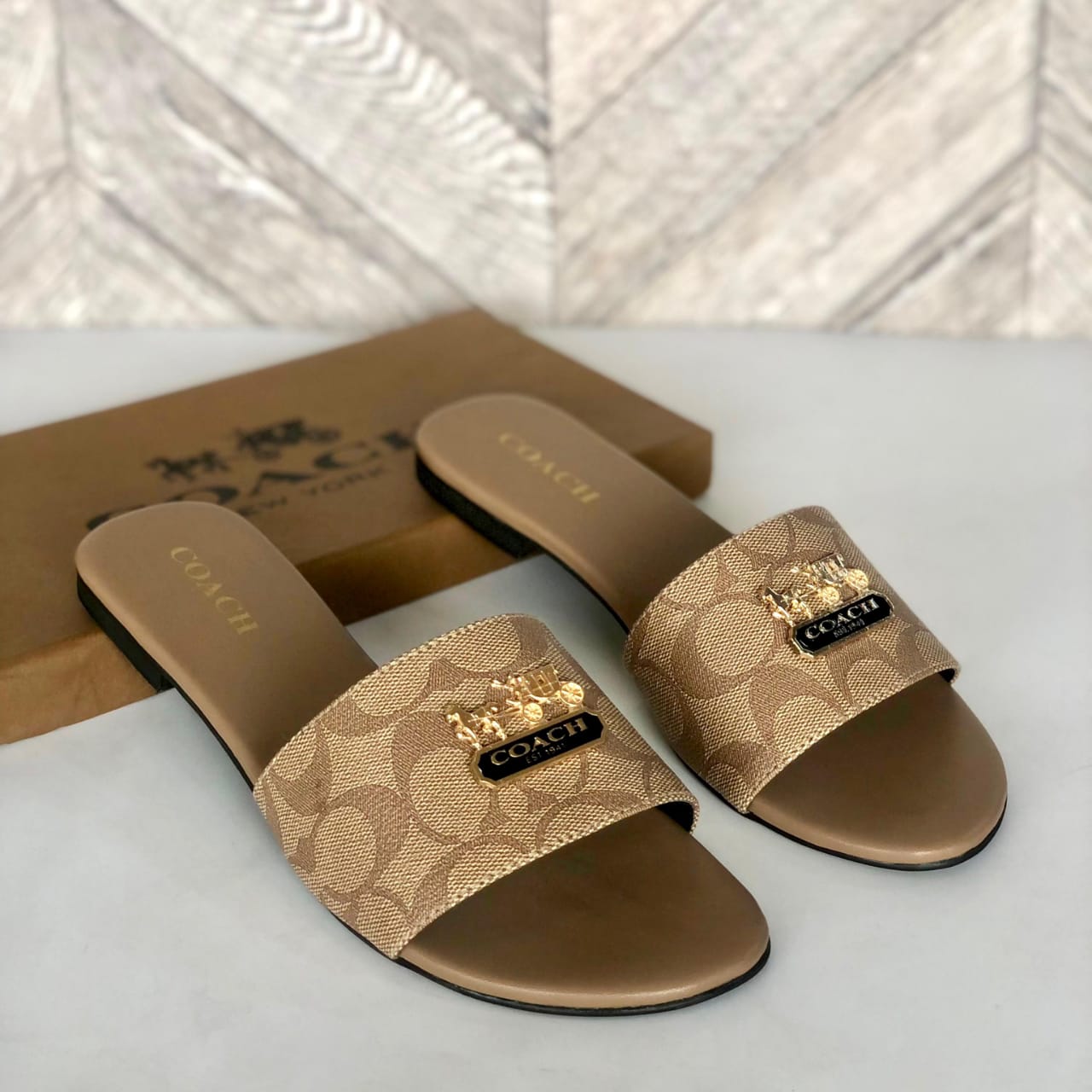 C-o-a-c-h slipper