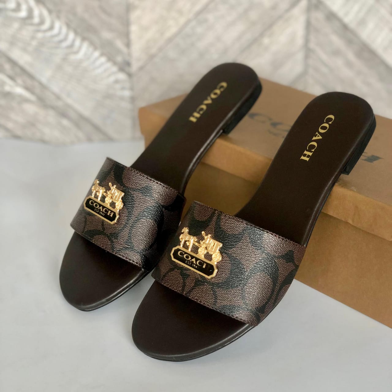 C-o-a-c-h slipper