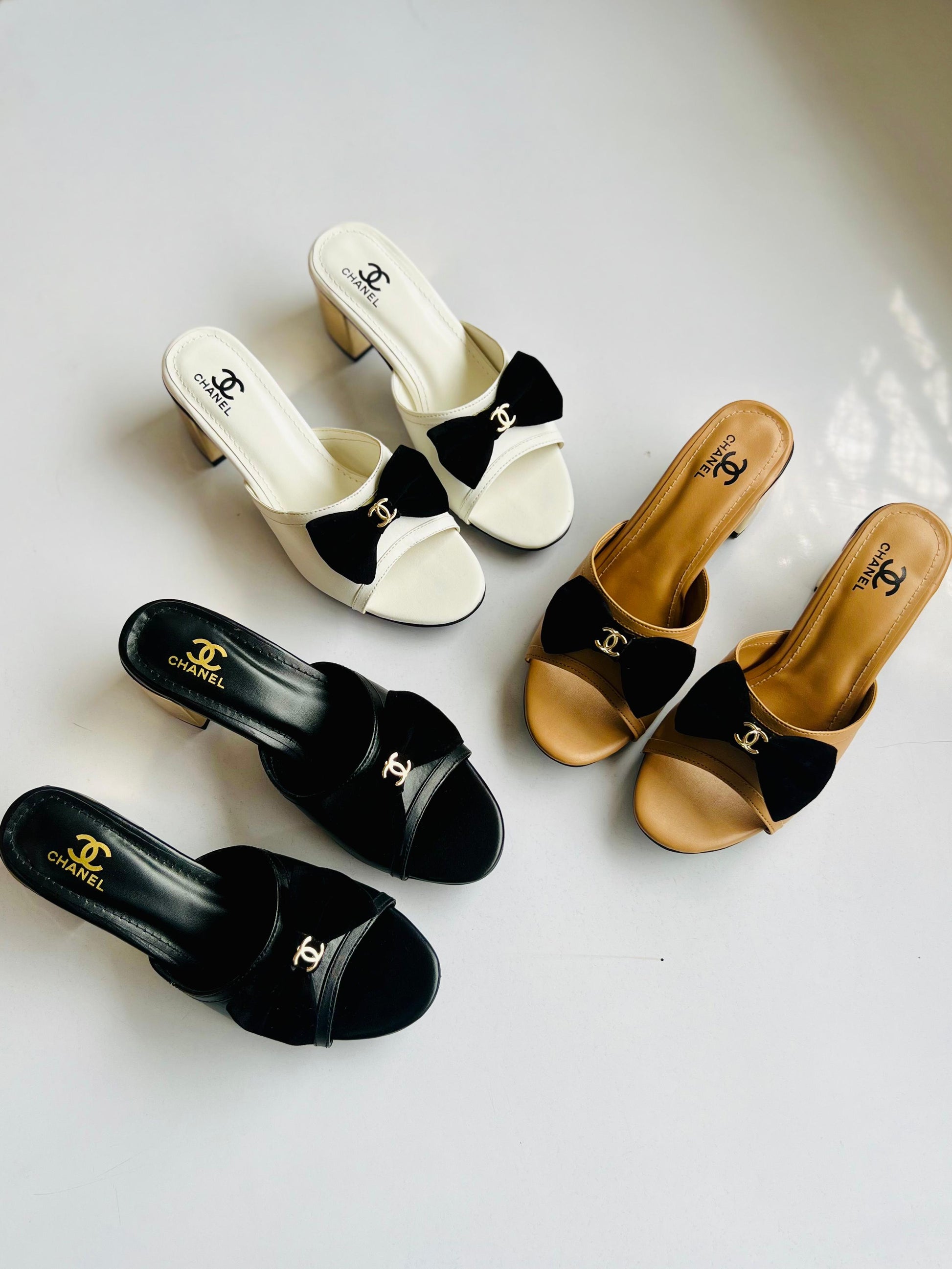 C-h-a-n-e-l bow heel