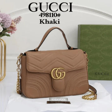 Gucci GG Marmont Khaki Handbag with Gold Logo – Chic Luxury Designer Bag for Women.