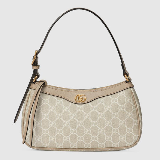 Side view of the Gucci Luxe Stylish Handbag, beige, pink, and brown leather, showcasing spacious compartments and sleek design.