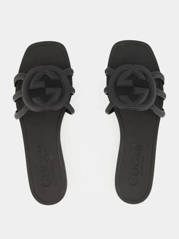 Front view of Gucci Mystic logo slide sandals in black – sleek and versatile women’s slides with luxury branding.