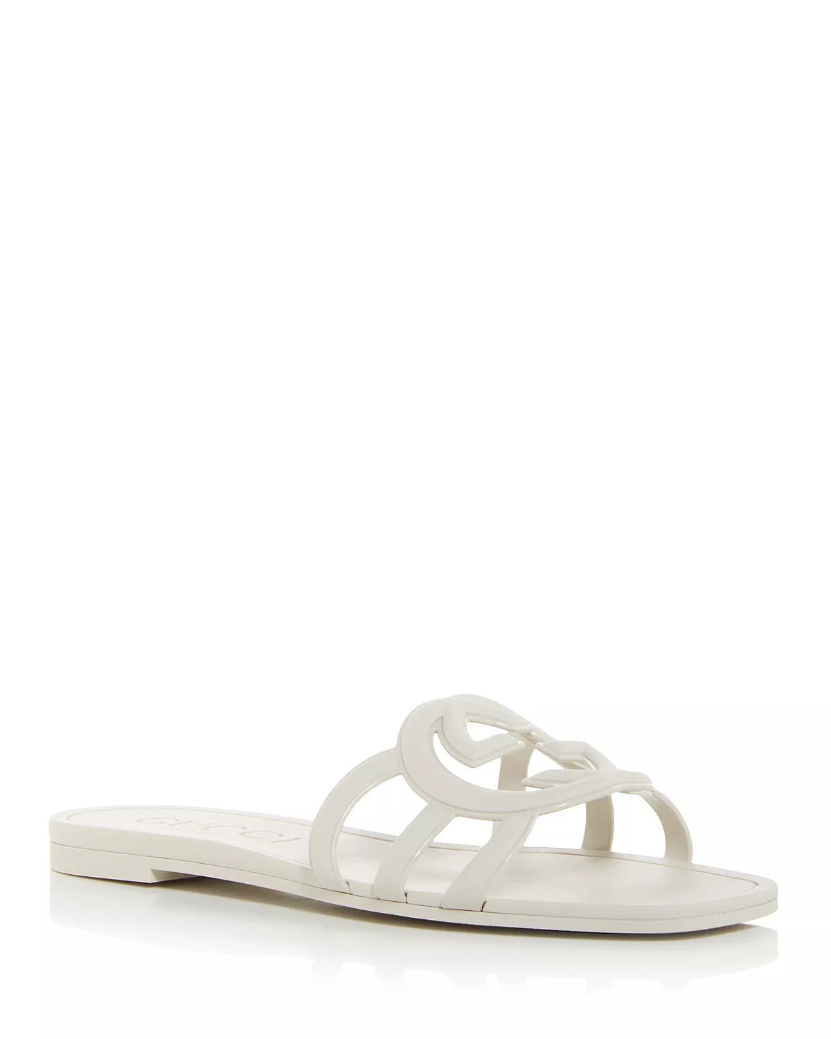 Front view of white Gucci Mystic logo slide sandals – chic women's designer footwear for warm-weather outfits.