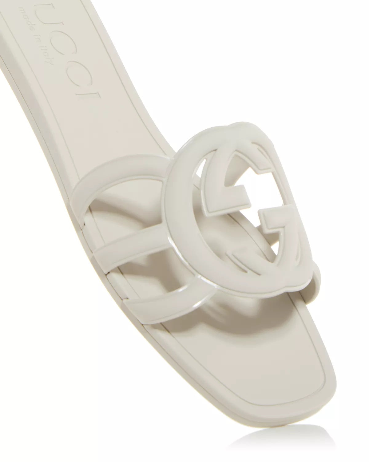 Model wearing Gucci Mystic logo slide sandals in white – premium women’s slides styled for effortless fashion.