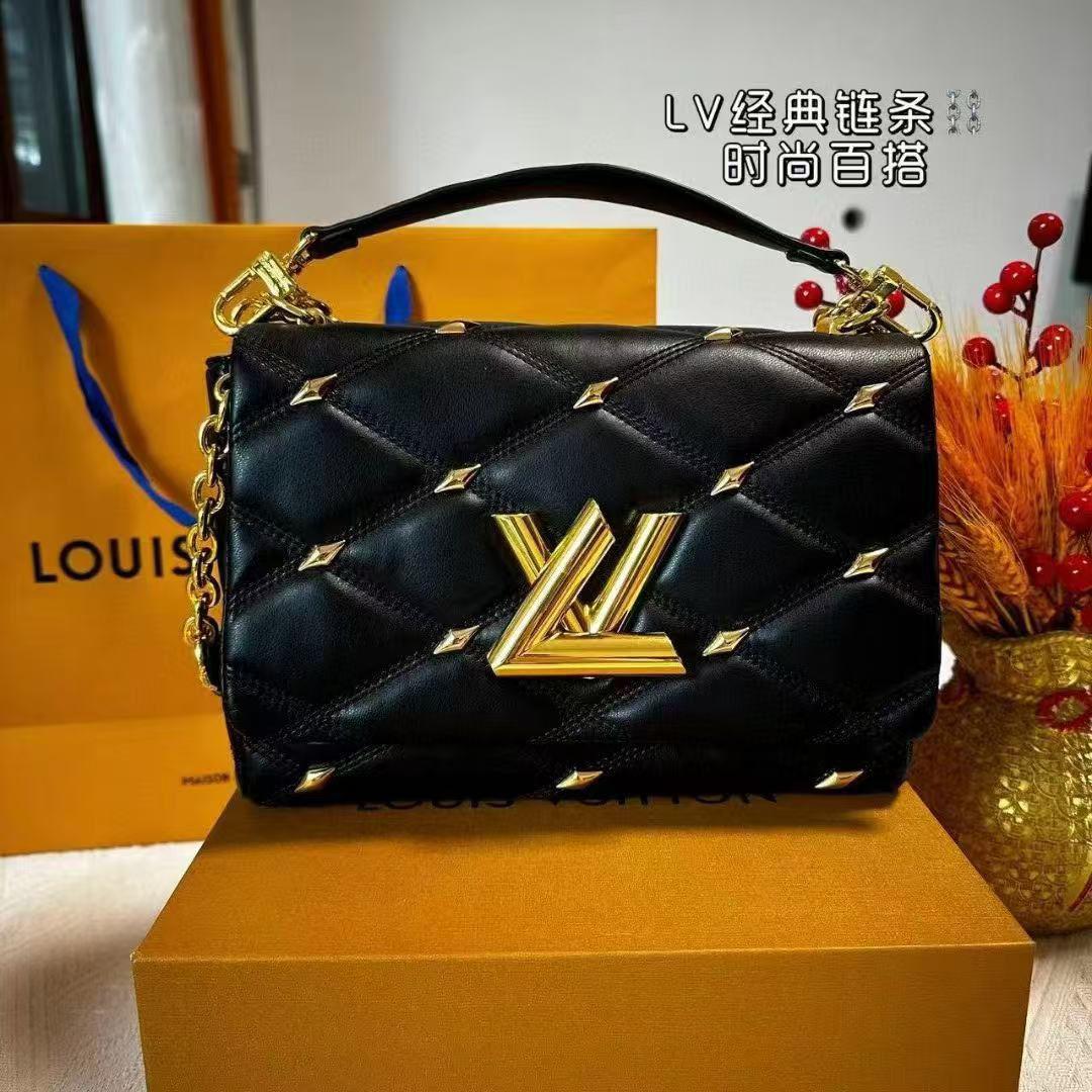 Louis Vuitton GO-14 MM Handbag in black quilted leather with gold hardware  
